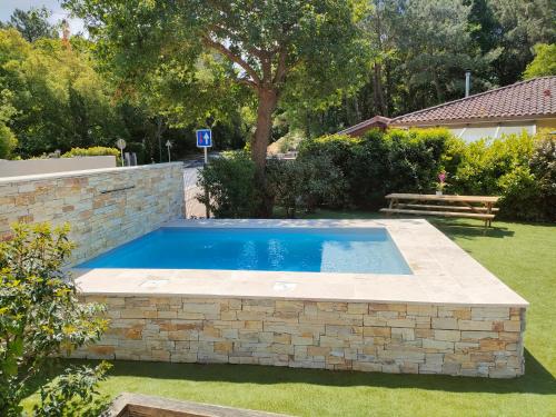 Πισίνα στο ή κοντά στο La VILLA OCEAN AVEC SPA et PISCINE - Les GITES DE CAMPARAN