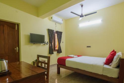 Fotografie z fotogalerie ubytování FabHotel Martine's Residency - French Colony, 5 Mins from Rock Beach v destinaci Puduččéri