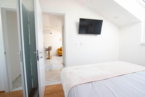 Postel nebo postele na pokoji v ubytování Luxury apartment Gold