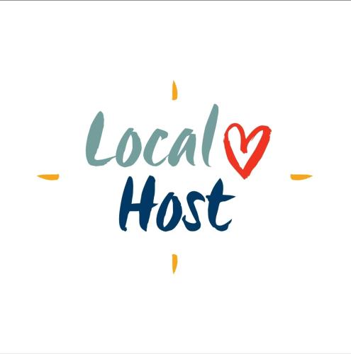 a hand drawn lettering local host with a red heart at Noel's dreams in Praputnjak