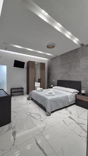 Ένα ή περισσότερα κρεβάτια σε δωμάτιο στο Dolce vita