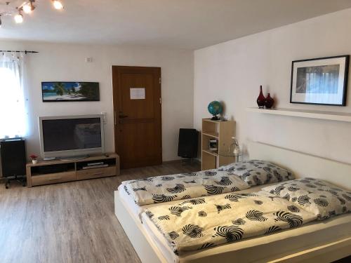 Katil atau katil-katil dalam bilik di Ferienwohnung Riesterer