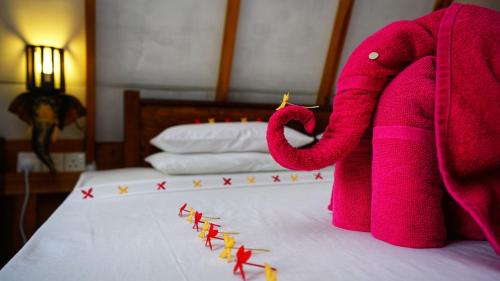 Katil atau katil-katil dalam bilik di Golden Rock Retreat Sigiriya