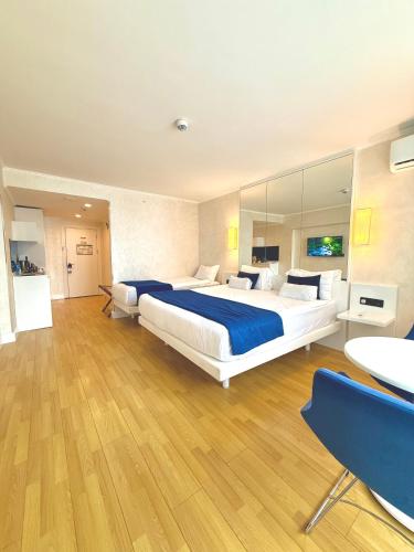 Ένα ή περισσότερα κρεβάτια σε δωμάτιο στο Batumi VIP hotel