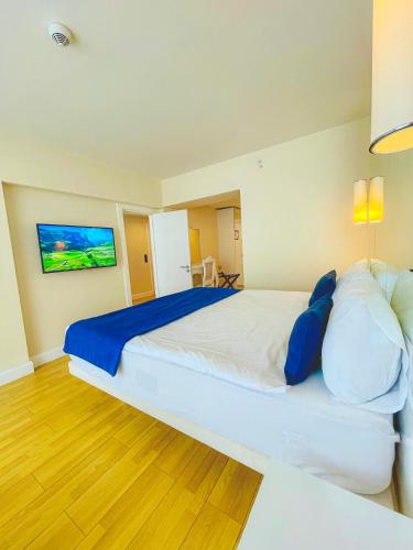 Ένα ή περισσότερα κρεβάτια σε δωμάτιο στο Batumi VIP hotel