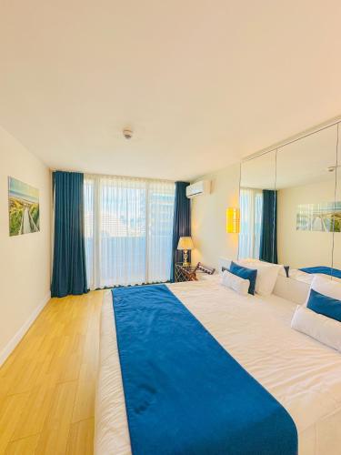 Ένα ή περισσότερα κρεβάτια σε δωμάτιο στο Batumi VIP hotel