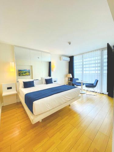Ένα ή περισσότερα κρεβάτια σε δωμάτιο στο Batumi VIP hotel