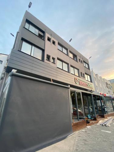 a building with a large billboard in front of it at Stylish Retreat in Nicosias Heart in North Nicosia