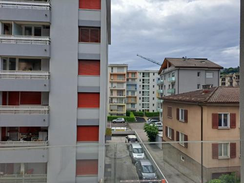 a view of a city street from a building at Urban Residence by Quokka 360 - Apartments with parking in Lugano in Aldesago