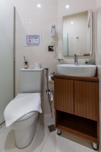 a bathroom with a toilet and a sink at Hillside Boutique Hotel Baku in Baku