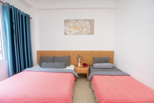 Ένα ή περισσότερα κρεβάτια σε δωμάτιο στο Phan Anh Hotel - Bui Vien Walking Street