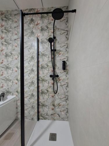 Bilik mandi di Medea Suites Apartamentos