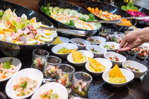 a buffet with a lot of food on a table at TUI BLUE Adriatic Beach - Adults Only - All Inclusive in Igrane