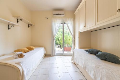 Ένα ή περισσότερα κρεβάτια σε δωμάτιο στο Simone Eden Apartment