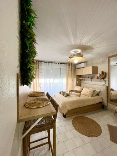 Katil atau katil-katil dalam bilik di Suite Evasion, Baignoire Balneo