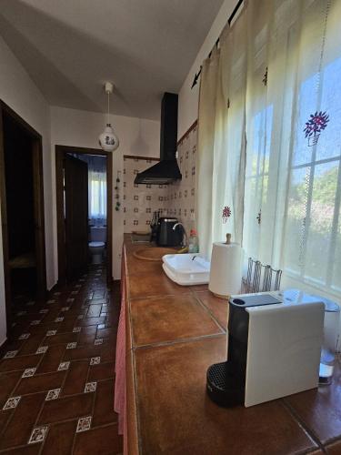 a kitchen with a counter top in a room at El Arrabal de la Barrosa in Chiclana de la Frontera