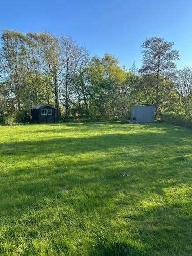 Taman di luar Ferienhaus Valentina auf Sylt