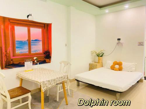 En eller flere senge i et værelse på May's Home