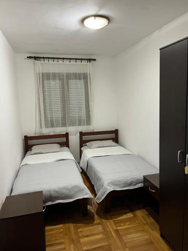 Cama o camas de una habitación en Family rest Budva