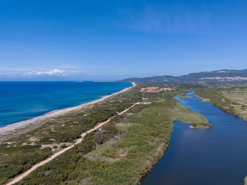 an aerial view of a beach and the ocean at Casa Loretta 3 in Valledoria