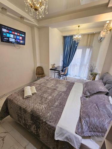 Postel nebo postele na pokoji v ubytování Bella Donna Hotel