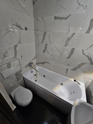Koupelna v ubytování Bella Donna Hotel