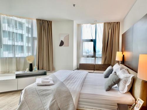 Katil atau katil-katil dalam bilik di Sathorn Prime Residence 2BR #Bangkok