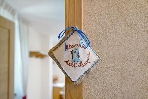 a sign on a wall that says happy new year at Agritur La Gemma in Sant'Orsola Terme
