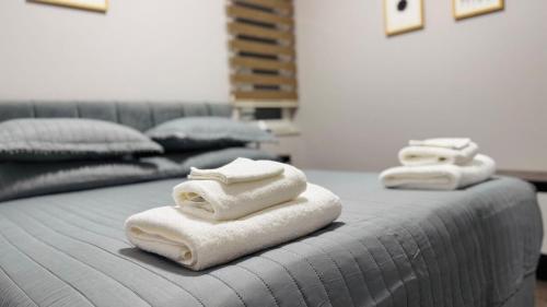 Ένα ή περισσότερα κρεβάτια σε δωμάτιο στο Apartment Bllok A