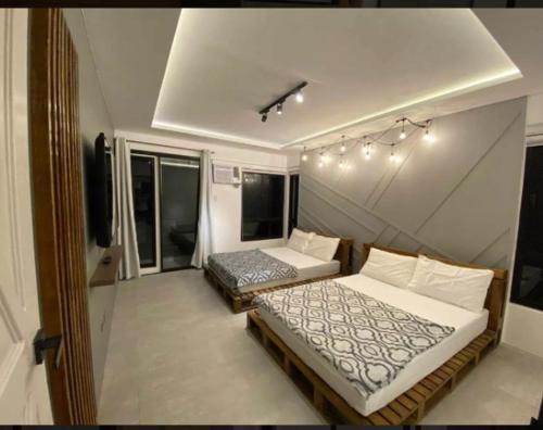 Ένα ή περισσότερα κρεβάτια σε δωμάτιο στο Amazing 4 bedroom Home