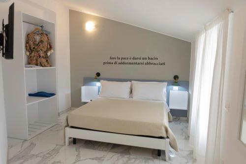 Postel nebo postele na pokoji v ubytování B&B Loft Suite