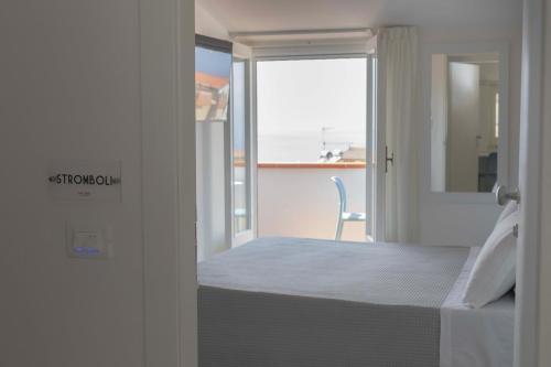 Postel nebo postele na pokoji v ubytování B&B Loft Suite