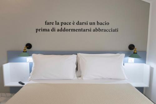 Postel nebo postele na pokoji v ubytování B&B Loft Suite