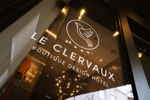 a sign in the window of a store at Le Clervaux Boutique Hotel & Spa in Clervaux