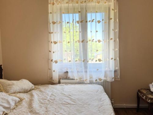 Postel nebo postele na pokoji v ubytování ungal