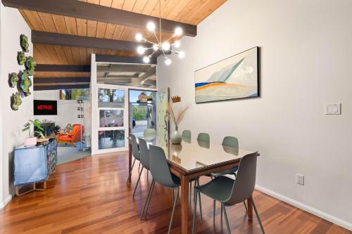 a dining room with a table and chairs at Luxury Hilltop Stay Pool, Firepit and Views in La Mesa