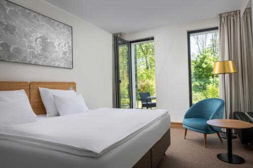 Ένα ή περισσότερα κρεβάτια σε δωμάτιο στο Hotel Golf Prague