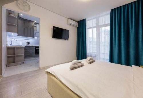 Postel nebo postele na pokoji v ubytování Nyvky Like Home - Nyvky Park Lux 149