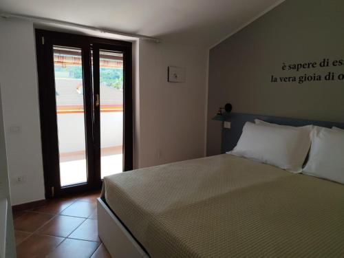 Postel nebo postele na pokoji v ubytování B&B Loft Suite