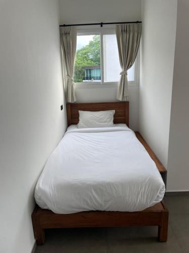Cama o camas de una habitación en Parkside Pai