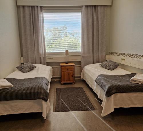 Postel nebo postele na pokoji v ubytování DB Hostel