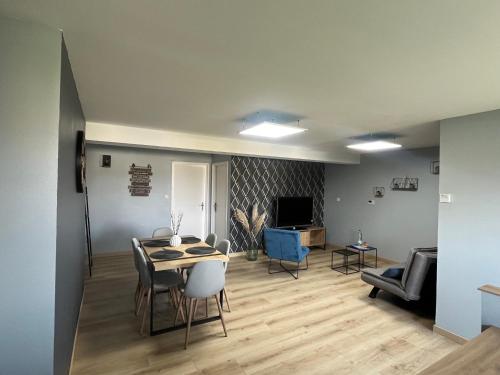 Charmant appartement Cosy porte de Colmarにあるシーティングエリア