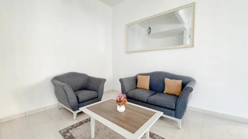 Гостиная зона в Raisa Homestay KLIA by Xpresso Home