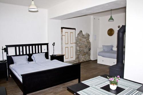 Postel nebo postele na pokoji v ubytování Penzion Albeř