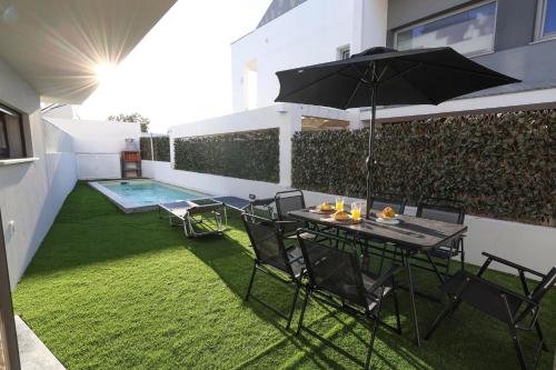 Bazén v ubytování Casa de ferias com Piscina e Suite nebo v jeho okolí