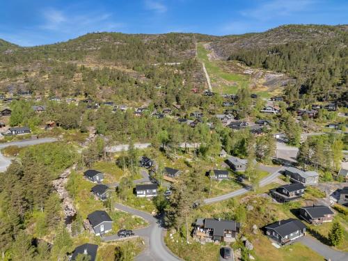 an aerial view of a village in the mountains at Holiday Home Berthabu by Interhome in Øyuvstad