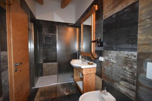Koupelna v ubytování Hotel Garni Arnica ***S