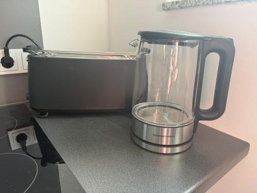 a blender sitting on top of a counter at Thirty for Three in Kürten