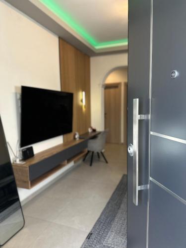 TV o dispositivi per l'intrattenimento presso BelAir Luxury Living - 'The One Villa'