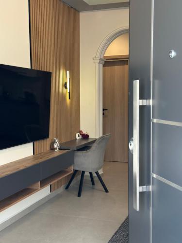 TV o dispositivi per l'intrattenimento presso BelAir Luxury Living - 'The One Villa'